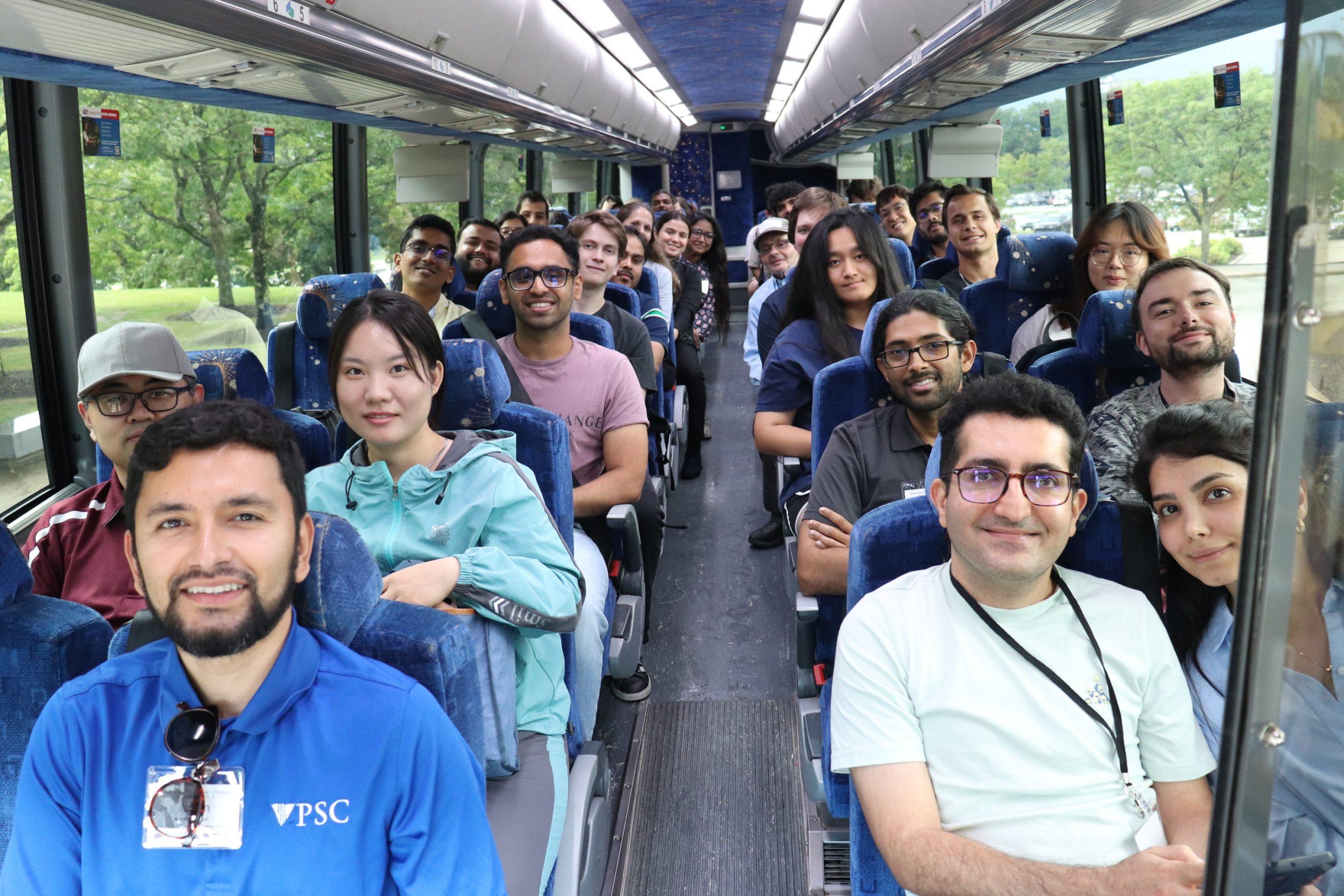 ByteBoost attendees and PSC staff on the bus to visit the PSC Machine Room.