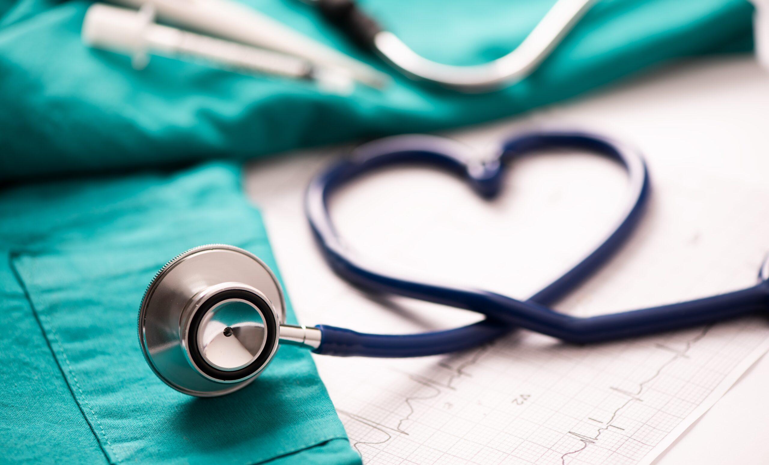 Medical stethoscope twisted in a heart shape. 