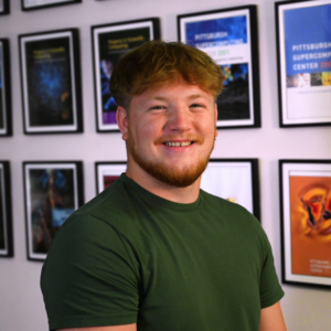 Portrait photo of a man with red hair and light skin tone.